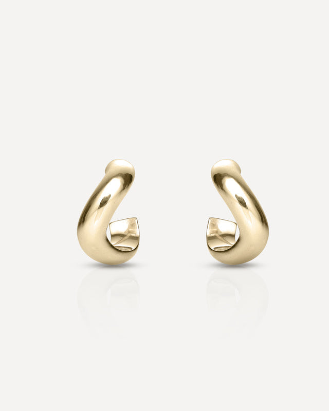 Elegant gold open hoop earrings with a polished finish, set against a plain white background. Luxury jewellery for a sophisticated style.
