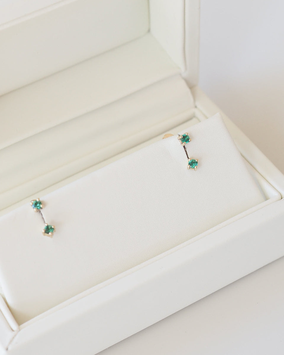 9ct gold birthstone studs with jackets in a jewellery box