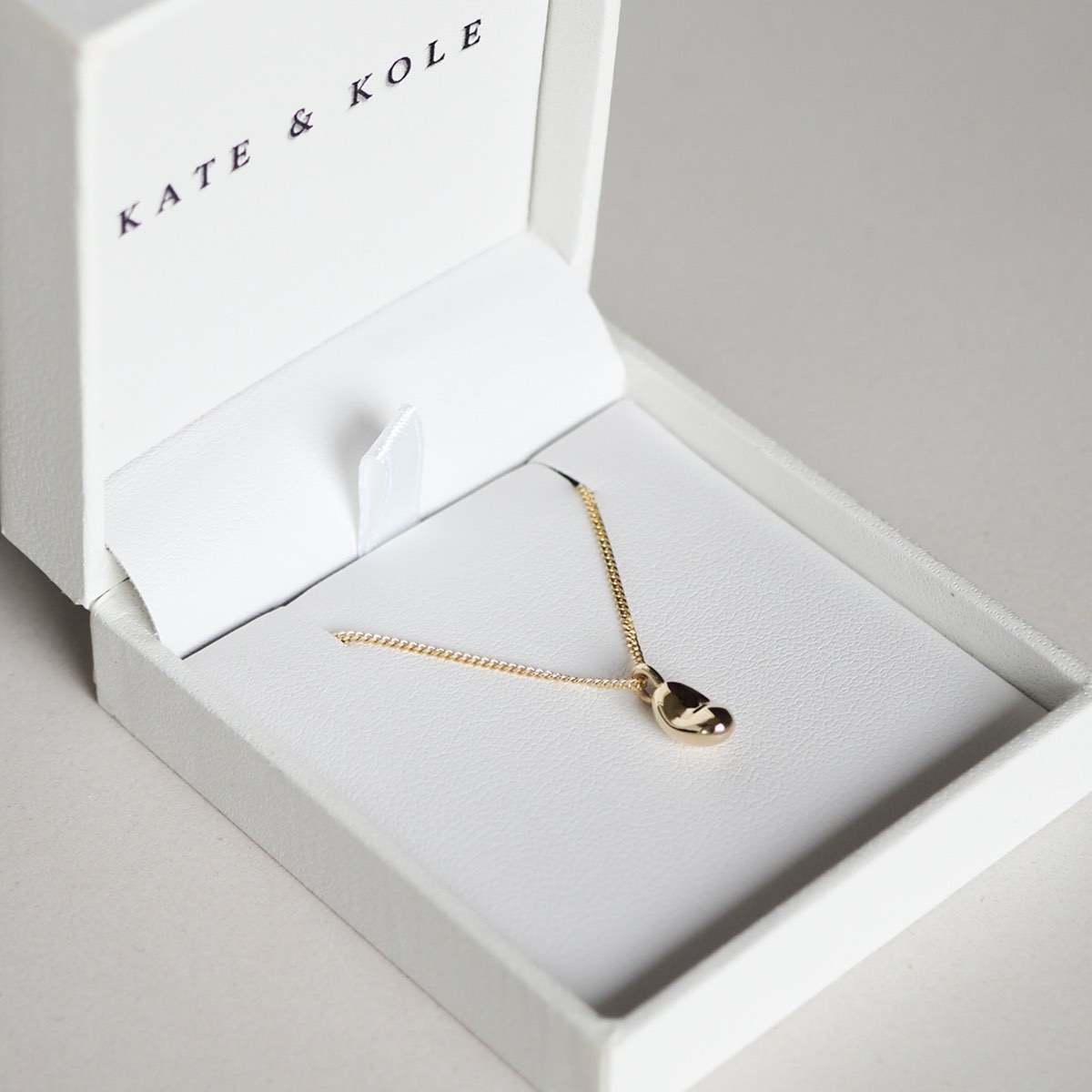 Baby in Time Necklace, solid 9ct gold miscarriage memorial pendant by Kate & Kole