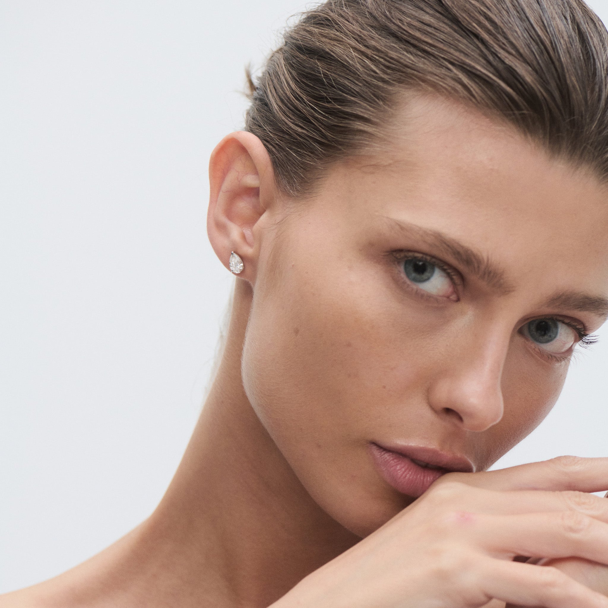 Pear Diamond Studs worn by model