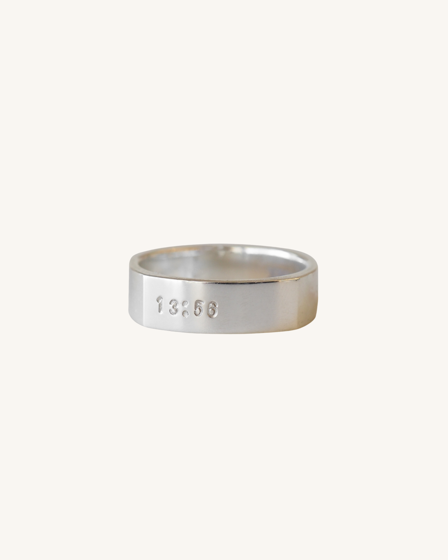 Stamped time ring on a white bakckground