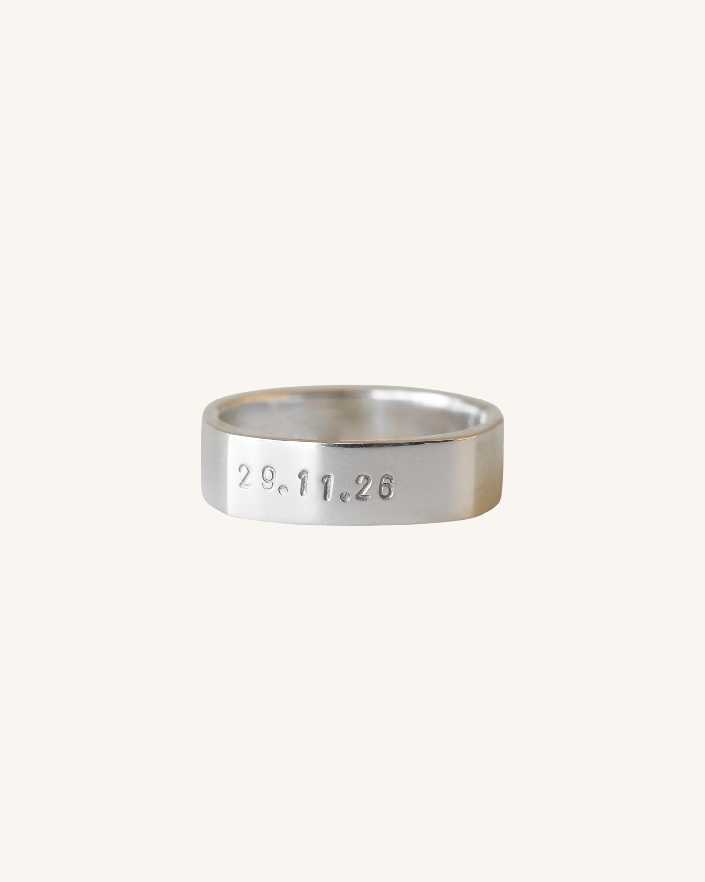 Date stamped ring on a white background