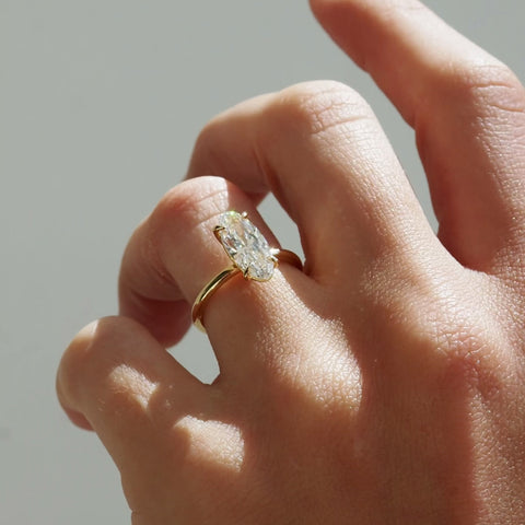 Model wearing Moval Diamond ring in the sunlight